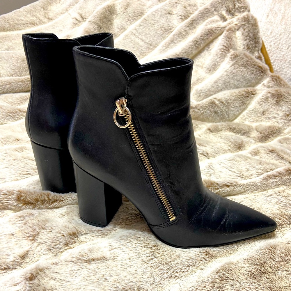 Nine West women’s heeled leather boots.